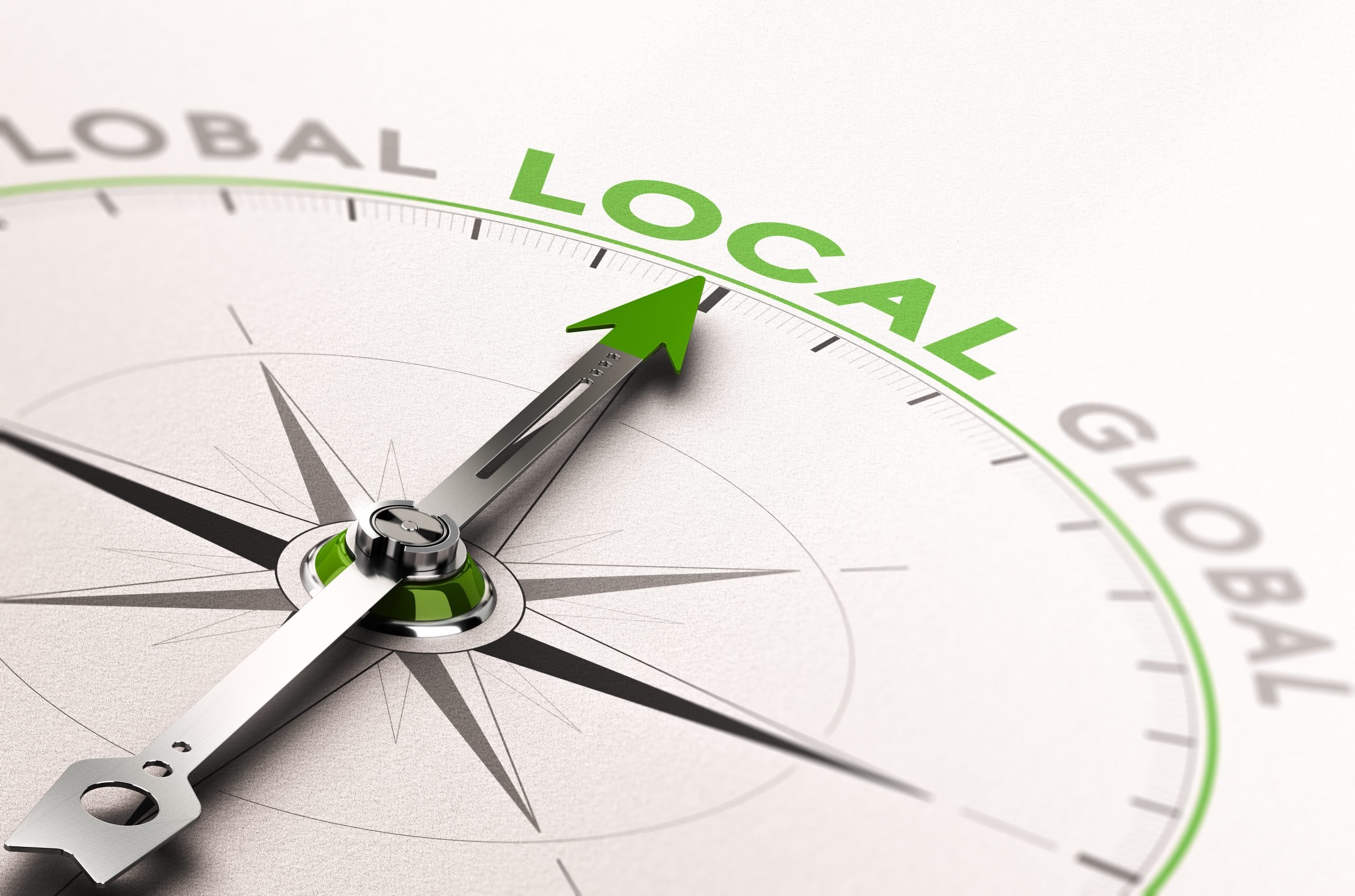 3D illustration of a compass with needle pointing the word local business. Concept of an ethical economy